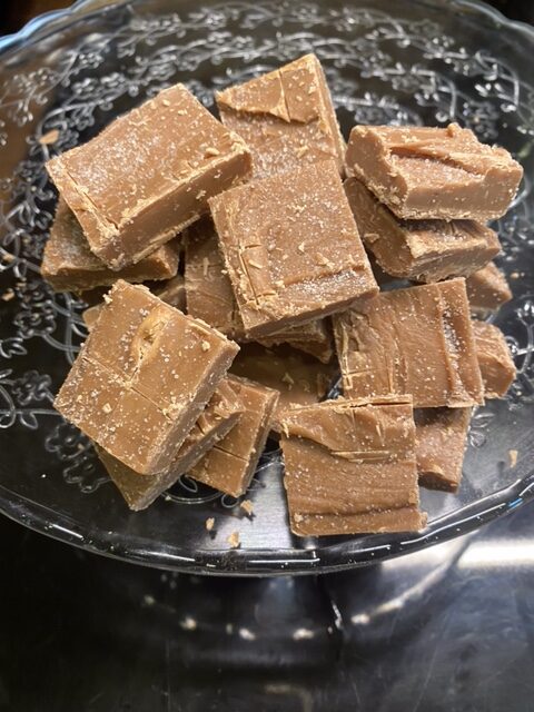 Plate of home made ginger fudge and salted caramel fudge