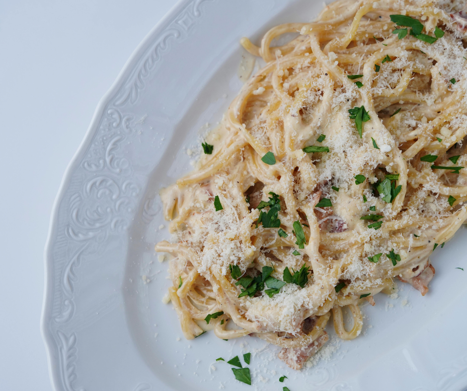 Linguine Alla Carbonara sprinkled with freshly grated paremsan